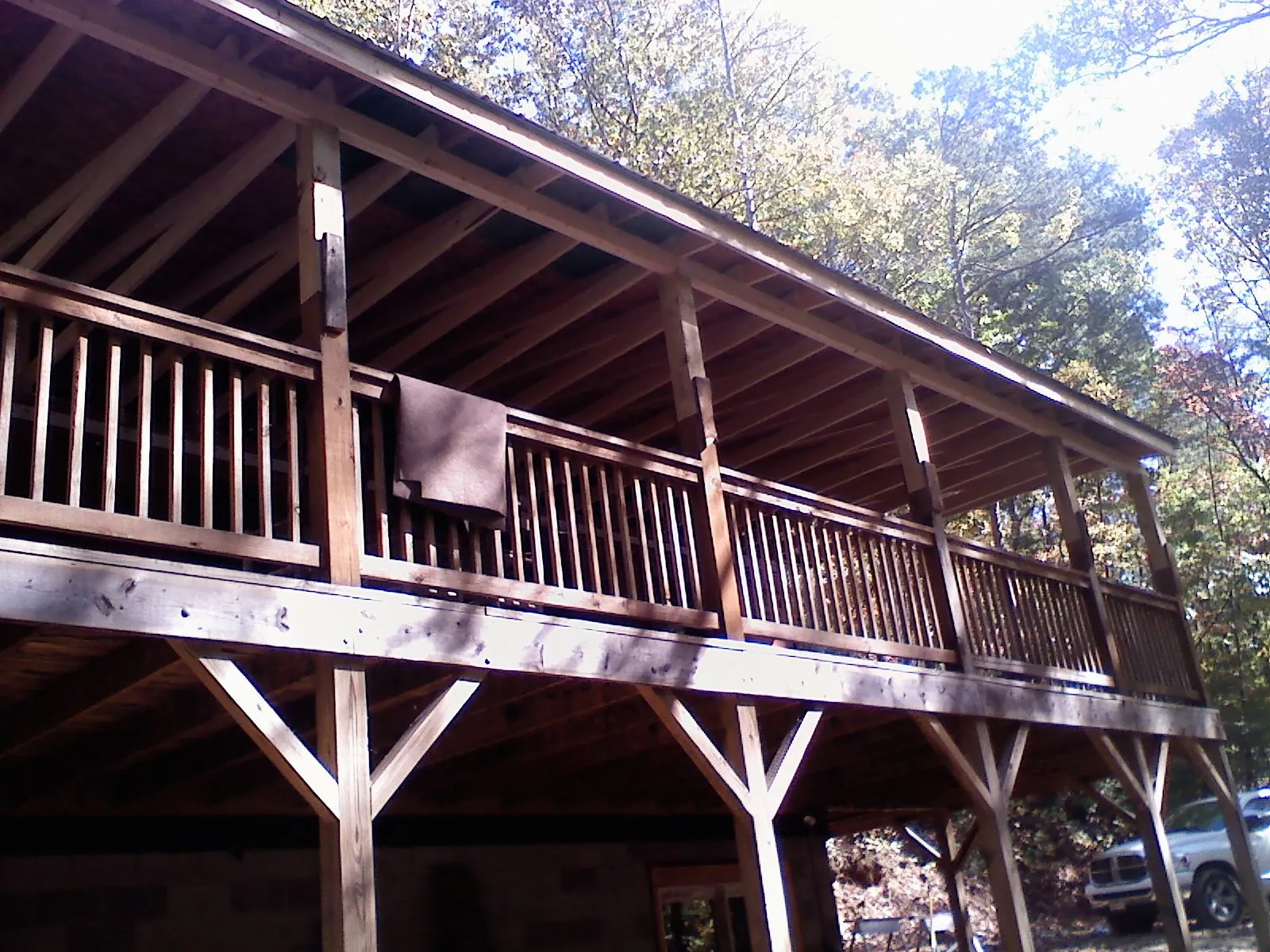 Timber framing under a new elevated porch and deck — Roof Leak Repair in Womelsdorf by Roofing Brothers